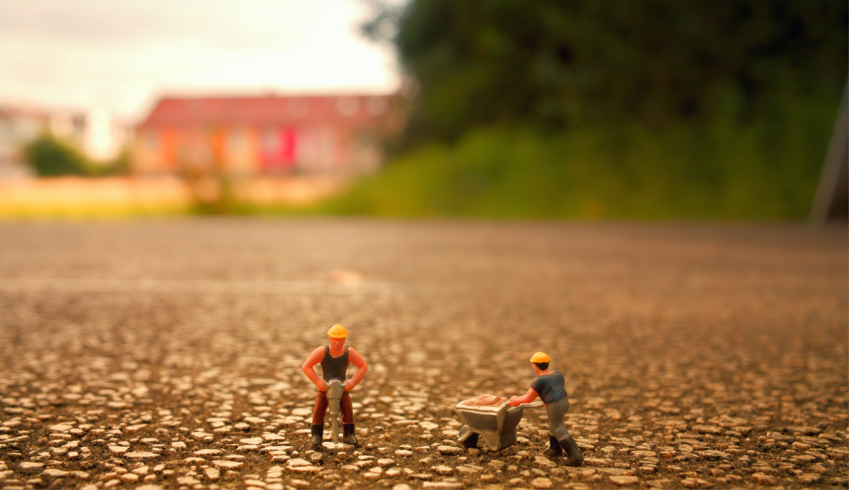 Toy construction workers doing what they do.